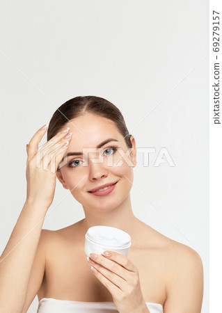 Woman Cleaning Face With White Pad.  69279157