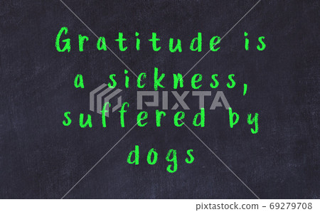Black chalkboard with wise inscription on it Black chalkboard with wise inscription on it 69279708