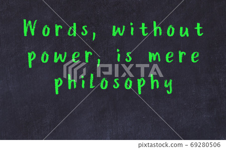 Chalk inscription of smart quote on black desk 69280506