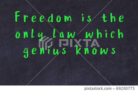 Chalk inscription of smart quote on black desk Chalk inscription of smart quote on black desk 69280773