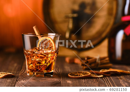 Cocktail with whisky and orange liquor 69281150