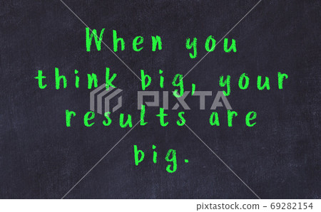 Chalk wise inscription on black chalkboard 69282154