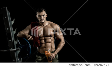 man bodybuilder hold shaker 69282575