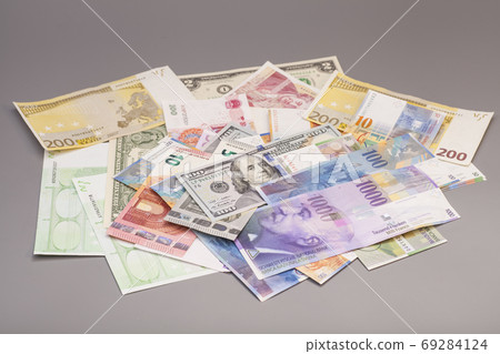 International currencies isolated on gray backgrond 69284124