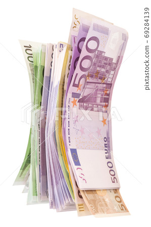 euro banknotes isolated on white background euro banknotes isolated on white background 69284139
