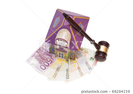 Home, euro money and gavel isolated on white.Real estate concept 69284159