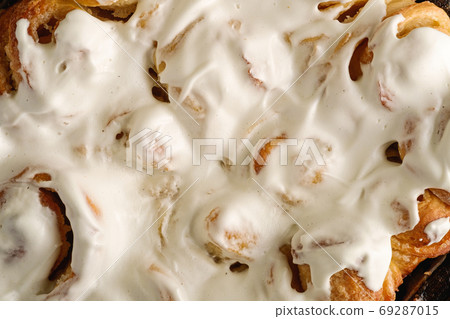 Sweet tasty homemade rose buns rolls with sugar whipped cream 69287015