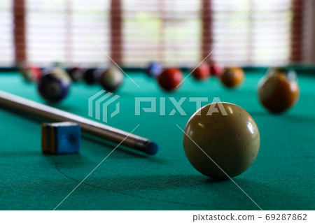 White Ball And Cue Stick On Pool Table 69287862