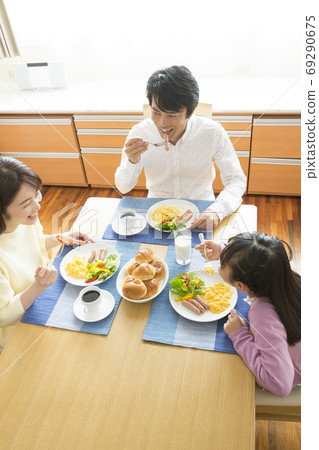 Family eating breakfast Family eating breakfast 69290675