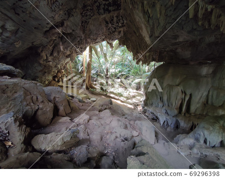 Wondelful limestone cave in day time, Thailand. Wondelful limestone cave in day time, Thailand. 69296398