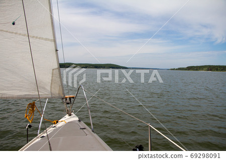 Shine Yacht tackle during voyage over sea waves, sailing concept. 69298091