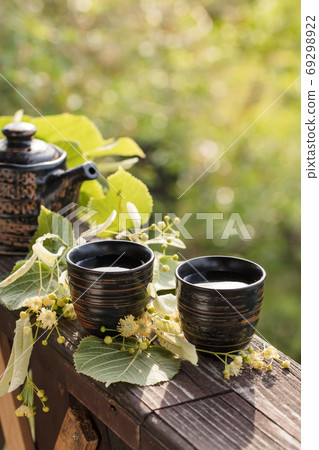 Linden tea and flowers. 69298922
