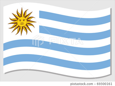 Waving flag of Uruguay vector graphic. Waving Uruguayan flag illustration. Uruguay country flag wavin in the wind is a symbol of freedom and independence. 69300161