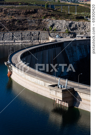 The Atazar reservoir and dam in the mountain range of Madrid The Atazar reservoir and dam in the mountain range of Madrid 69300420