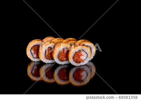 Fresh sushi rolls prepared from the best varieties of fish and seafood Fresh sushi rolls prepared from the best varieties of fish and seafood 69301356