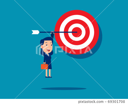 A businesswoman hanging on an arrow that sticks out of the targe A businesswoman hanging on an arrow that sticks out of the targe 69301708