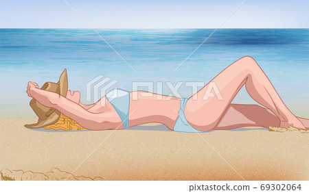 Young blonde woman in blue swimsuit and hat laying on the beach near the water. Relaxing in nature 69302064