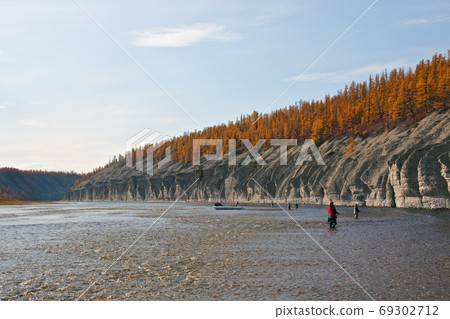Fishing and fishermen with their boat on the Siberian  river 69302712