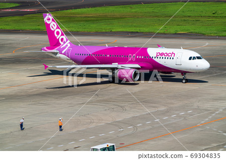 Scenery of the airport Grand handling staff who see off from an airplane taking off Natori City, Miyagi Prefecture Scenery of the airport Grand handling staff who see off from an airplane taking off Natori City, Miyagi Prefecture 69304835