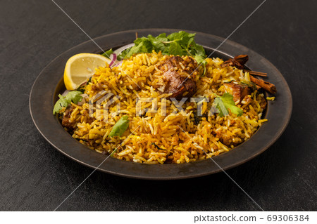 Biryani is a typical Indian mixed rice Biryani is a typical Indian mixed rice 69306384