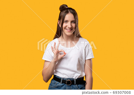 ok gesture approval sign happy woman showing yes ok gesture approval sign happy woman showing yes 69307008