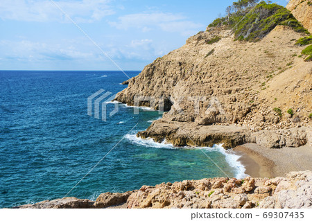Llop Mari beach in Hospitalet del Infant, Spain Llop Mari beach in Hospitalet del Infant, Spain 69307435