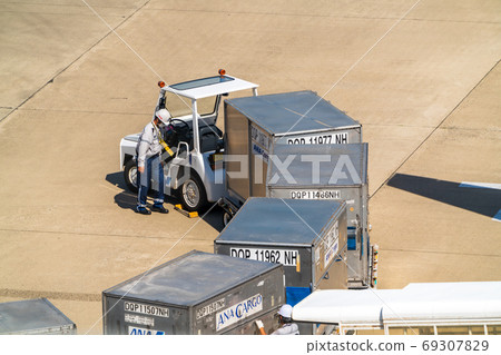 Airport view Towing tractor and container Natori City, Miyagi Prefecture 69307829