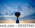 Telescope look at the sky clouds sunrise 69307840