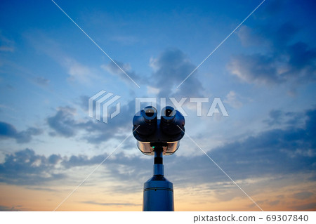 Telescope look at the sky clouds sunrise 69307840