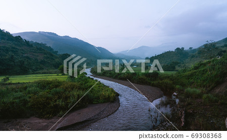 Mountains and green rice fields in the evening Nature 69308368
