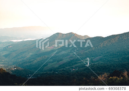 Mountains and fog in the morning on the hill Mountains and fog in the morning on the hill 69308378