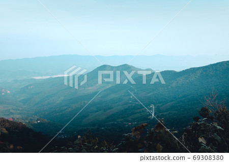Mountains and fog in the morning on the hill 69308380