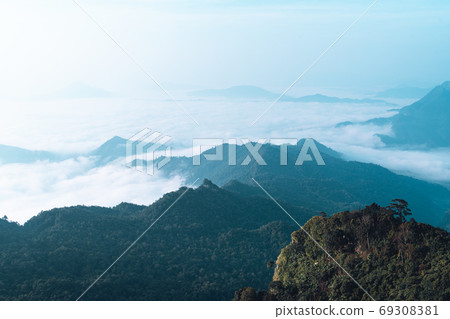 Mountains and fog in the morning on the hill 69308381