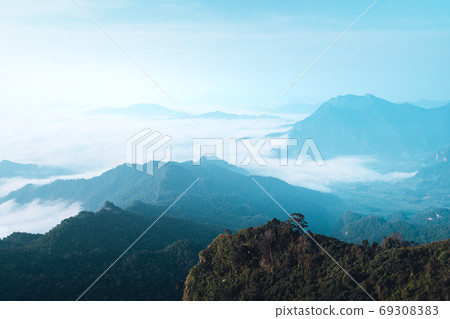 Mountains and fog in the morning on the hill Mountains and fog in the morning on the hill 69308383