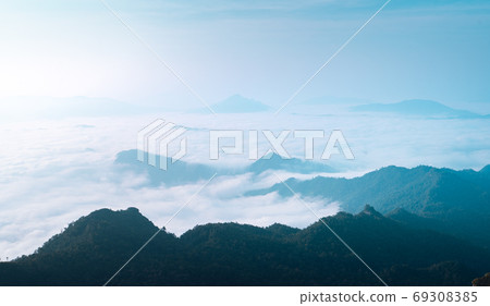 Mountains and fog in the morning on the hill Mountains and fog in the morning on the hill 69308385