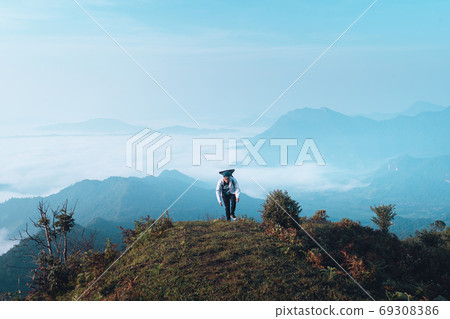 Mountains and fog in the morning on the hill Mountains and fog in the morning on the hill 69308386
