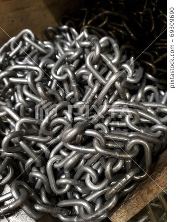 galvanized chain lies in a drawer, selling chain shop 69309690
