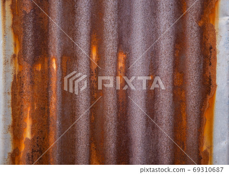 Zinc surface that is old and rusted. 69310687