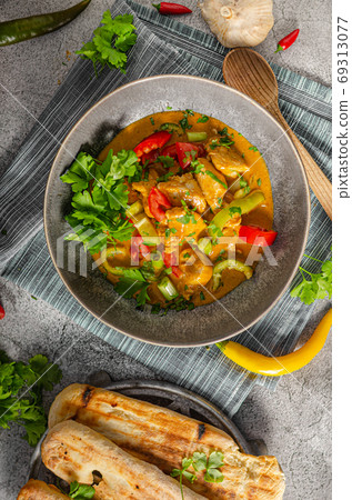 Spicy curry with meat and vegetable Spicy curry with meat and vegetable 69313077