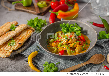 Spicy curry with meat and vegetable Spicy curry with meat and vegetable 69313079