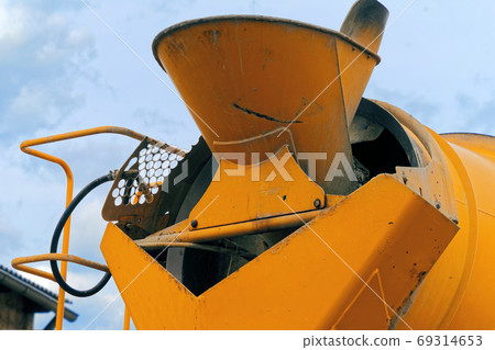 Close-up of the rear part of a concrete mixer Close-up of the rear part of a concrete mixer 69314653