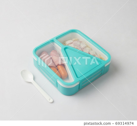 Tiffin box carrier with food isolated on white 69314974