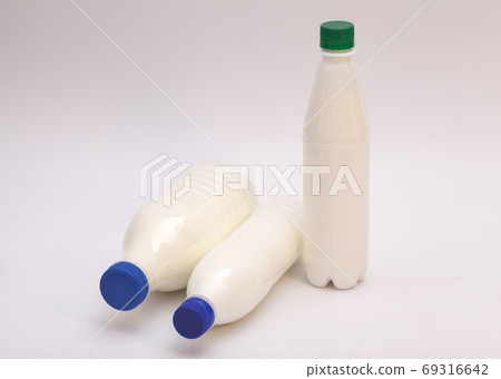 Plastic Bottles of milk Plastic Bottles of milk 69316642