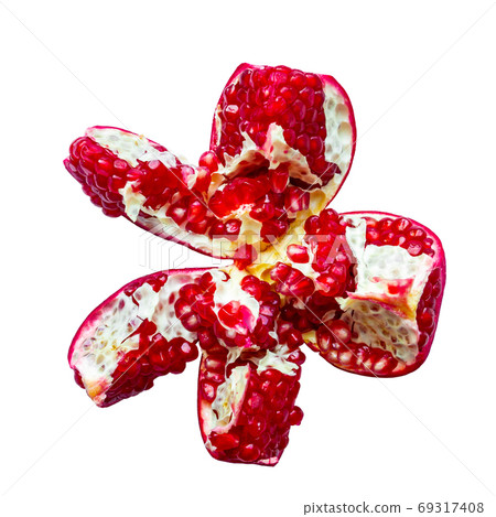 Open fresh ripe pomegranate isolated on white Open fresh ripe pomegranate isolated on white 69317408