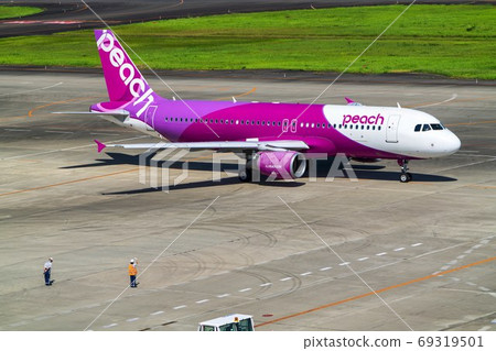 Scenery of the airport Grand handling staff who see off from an airplane taking off Natori City, Miyagi Prefecture Scenery of the airport Grand handling staff who see off from an airplane taking off Natori City, Miyagi Prefecture 69319501
