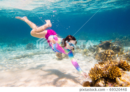 Child snorkeling. Kids underwater. Beach and sea. Child snorkeling. Kids underwater. Beach and sea. 69320448