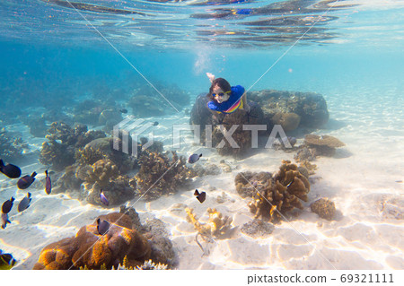 Child snorkeling. Kids underwater. Beach and sea. Child snorkeling. Kids underwater. Beach and sea. 69321111