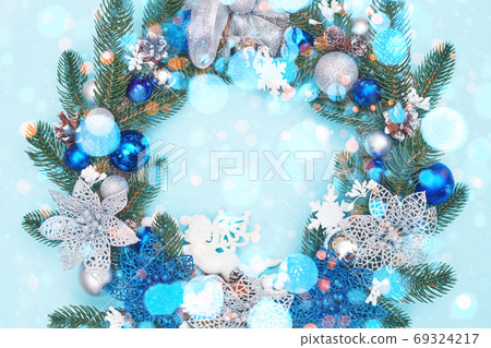 christmas wreath on a blue background, flatley, copy space christmas wreath on a blue background, flatley, copy space 69324217