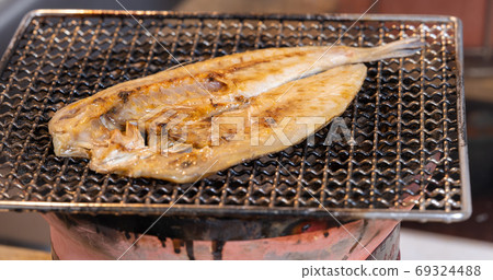 Dried tilefish (Amadai), charcoal-grilled on a shichirin 69324488