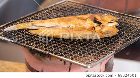 Dried tilefish (Amadai), charcoal-grilled on a shichirin 69324501